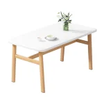 The table_ is a rectangular OEM piece featuring a white top and wooden legs, displaying a small vase with flowers, a cup, and a plate with saucer.