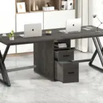 The 01.01.C_结果 is a modern double workstation desk featuring two laptops, two desk lamps, a plant, and two drawers, ideal for ODM or OEM workspace solutions in a bright office with tile flooring and shelves.
