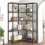The 01.01.C_结果 is a five-tier black and wood corner bookshelf, ideal for OEM or ODM projects, showcasing books, vases, decor, storage boxes, and pillows against a light wall near an arched doorway and plant.