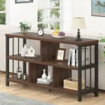 The 02c_结果 is a wooden and metal console table with three shelves, perfect for displaying decor, books, a lamp, clock, and fruit in a bright living room—available for OEM or ODM customization.