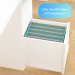 The 05.01.C_结果 is a white OEM file drawer with a hanging rod for organizing letter-size folders; it fits under a white desk on a wood floor. A blue label marks it as a "Letter size file drawer with hanging rod.