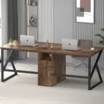 A modern home office features 06.01.C_结果: a double wooden desk, two laptops, minimal decor, a shelf with items, gray chair, abstract wall art—creating an ideal workspace for OEM or ODM projects.