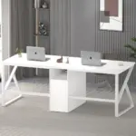 The 06.01.C_结果 is a modern white double-sided desk with two laptops, small decor, shelves in the background, and a minimalist office vibe—perfect for ODM or OEM office furniture solutions.