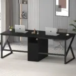 The 06.01.C_结果 is a modern double desk setup with two open laptops, decorative items, and a chair—perfect for OEM or ODM workspaces. Shelves, artwork, and neutral decor complete its contemporary minimalist office style.