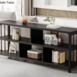 The 5_结果 is a long, dark wood sofa table with open shelves—perfect for ODM or OEM projects—displaying books, baskets, a plant, and décor, and fitting seamlessly against the wall in any modern living room.