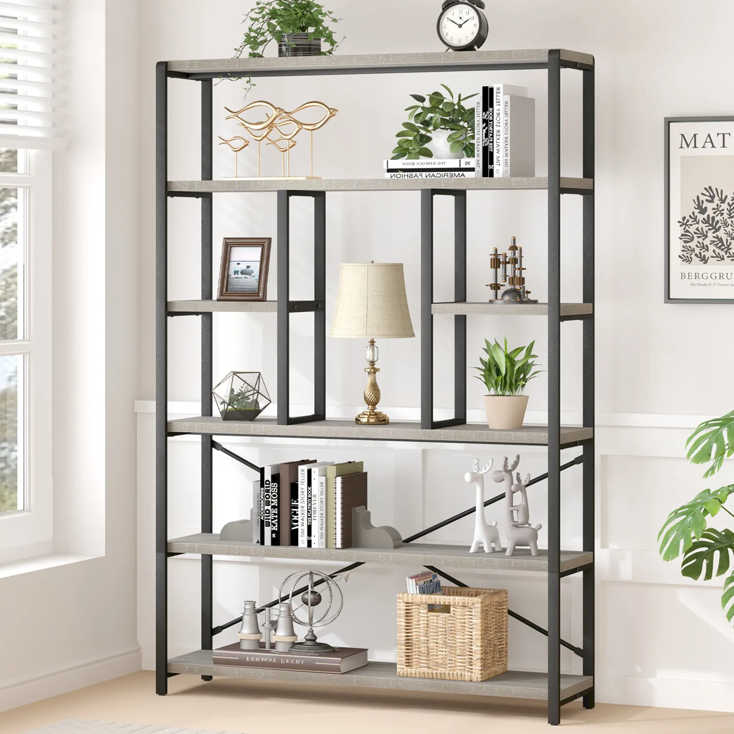 The 6 Tier Bookshelf in Light Gray Oak displays books, decor, plants, a clock, and a wicker basket. This shelf stands against a white wall in a bright room.