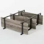 The BC02-02 04 - 03 3-Shelf Rustic Industrial Bookcase, featuring a wood and metal frame, is displayed upside down on a white background, highlighting its legs and support structure. Suitable for OEM or ODM production.