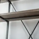 Close-up of the BC02-03 05 - 03 4-Shelf Industrial Rustic Bookshelf, featuring a metal frame, wooden shelves, and X-shaped support—perfect for ODM and OEM customization.