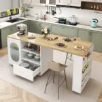 Modern kitchen with a central island featuring a wooden countertop, bar stool, open shelves with dishes, drawer, spice rack, and a coffee machine; place settings are arranged on the island.