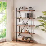 A metal and wood bookshelf stands by a sunny window, holding books, plants, a picture frame, baskets, and decorative items. A leafy plant sits nearby.