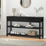 The Sofa Table with 3 Drawers, Black Oak features two open shelves and displays a lamp, books, basket, decor, shoes, and a vase under a round mirror—an elegant furniture piece for any living room.